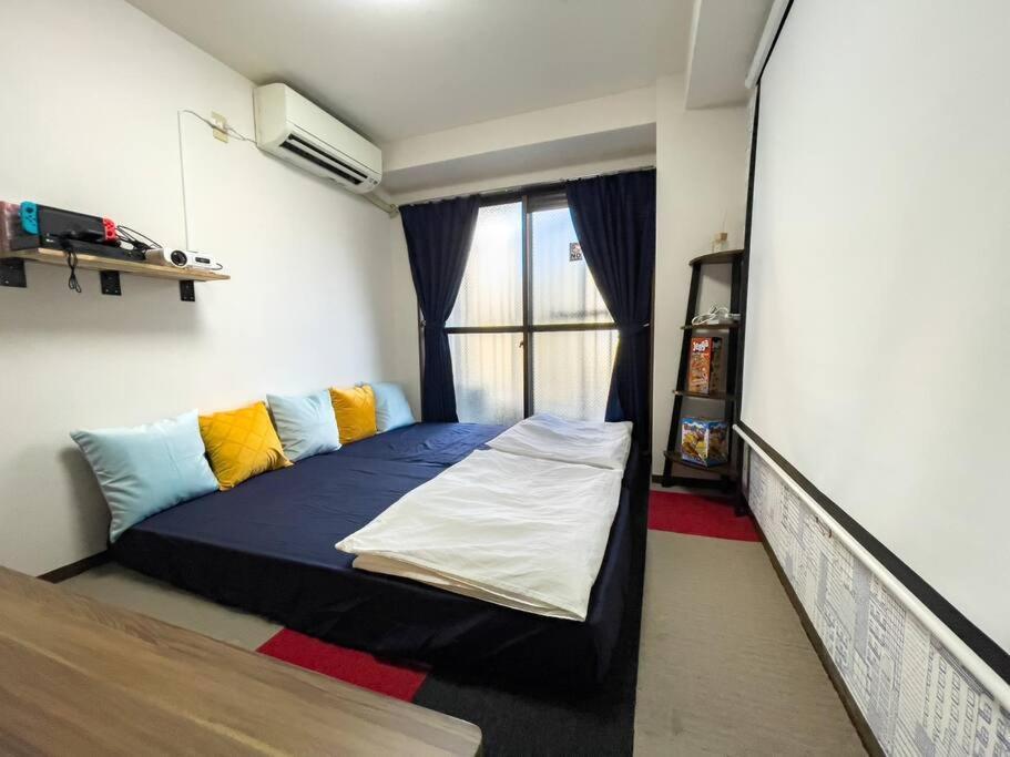 Tasonestayosaka なんば大国シティハイツ402 Apartemen *
